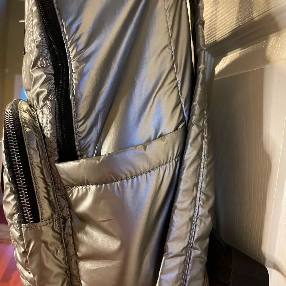 Juicy Couture Metallic quilted silver Backpack with black trim. - Picture 11 of 16